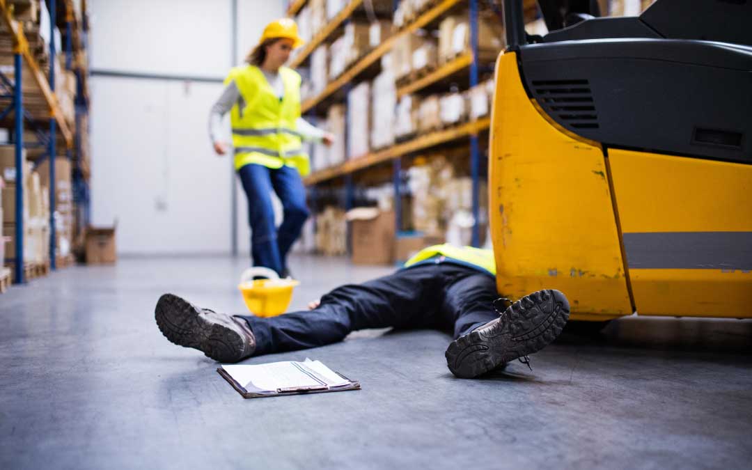 female discovering injured person in warehouse